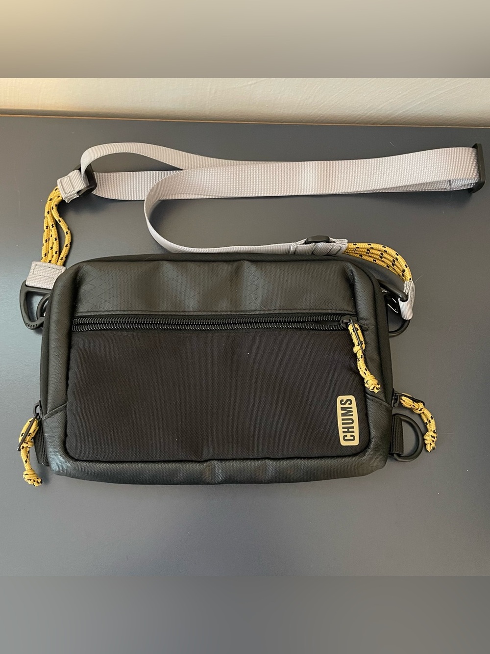 Chums Crossbody Bag yellow and black with adjustable straps and pockets